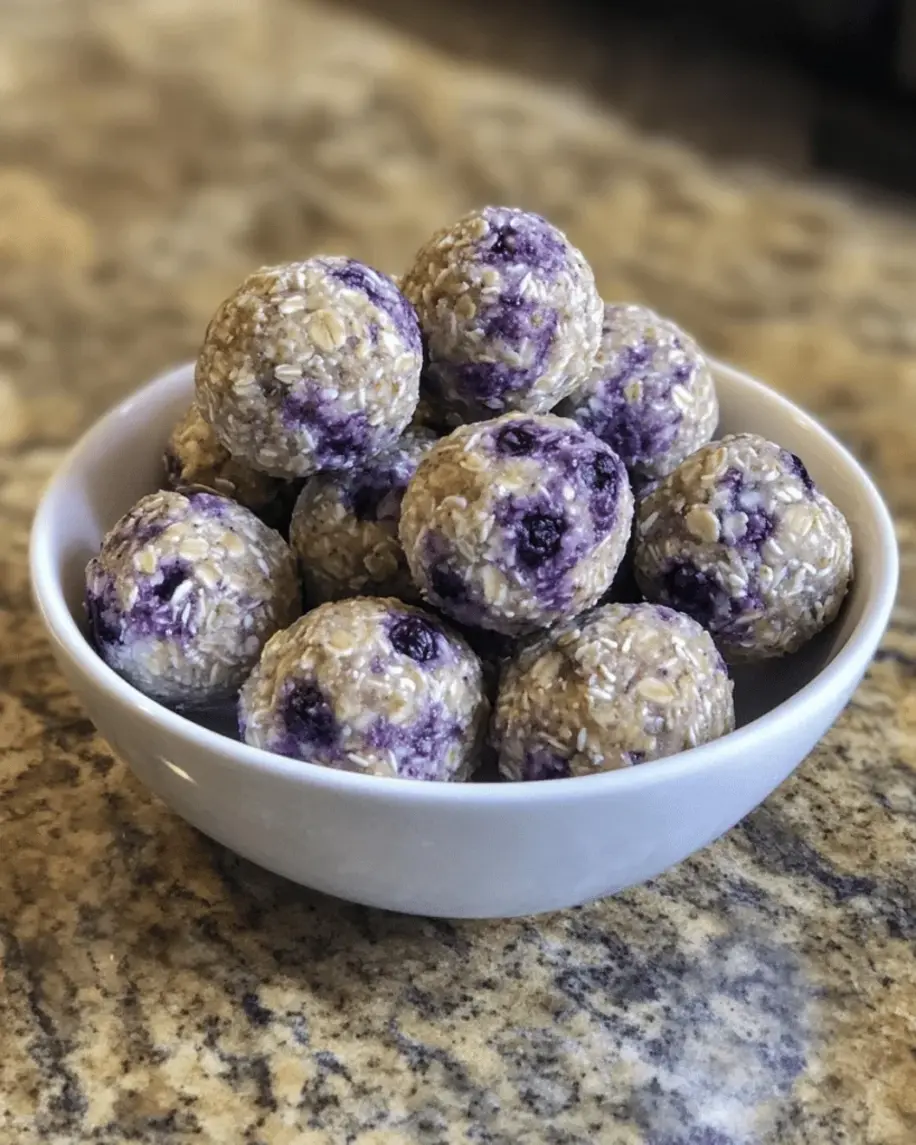Finished banana and blueberry balls for dogs arranged on a plate, ready to enjoy