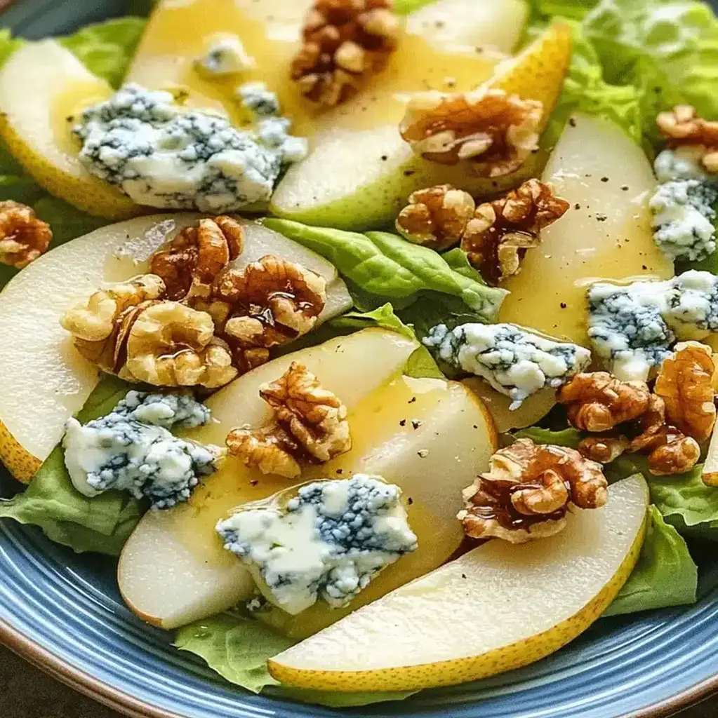Barefoot Contessa Pear and Blue Cheese Salad with toasted walnuts and a lemon-honey vinaigrette.